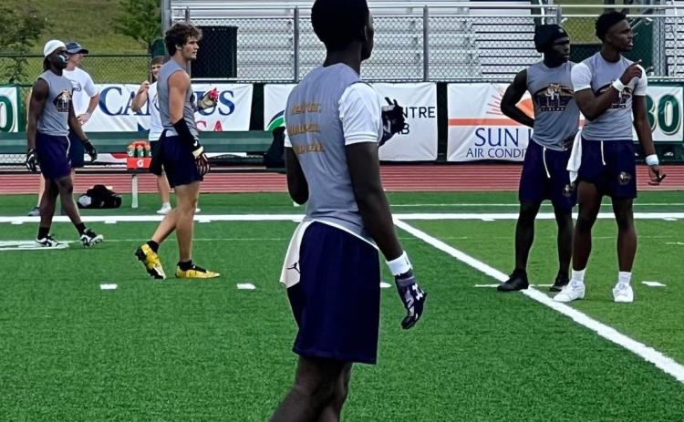 Columbia's offense receives a play call during the FHS 7v7 Tournament that took place Friday and Saturday. (COURTESY)