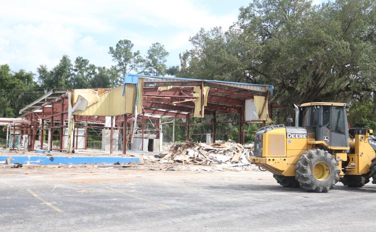 The old I-75 Autos building is being demolished along Duval Street (U.S. Highway 90). A Wawa convenience store is planned for the site, although no building permit has been applied for yet through the City of Lake City. (MORGAN MCMULLEN/Lake City Reporter)