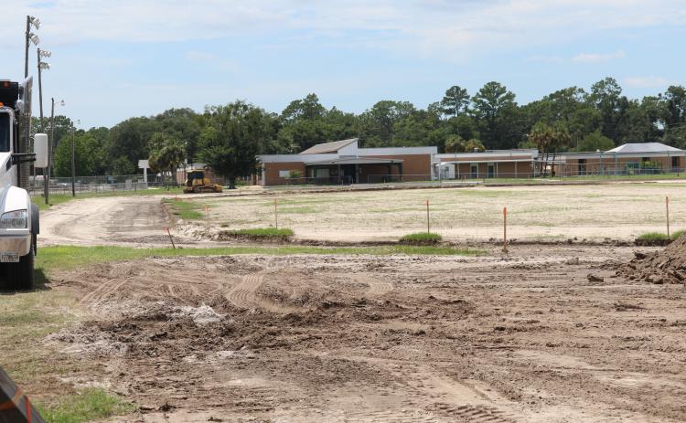Suwannee High School’s track is being replaced after the old asphalt surface was ‘completely destroyed’ by heavy equipment during the Hurricane Idalia response. (JAMIE WACHTER/Lake City Reporter)