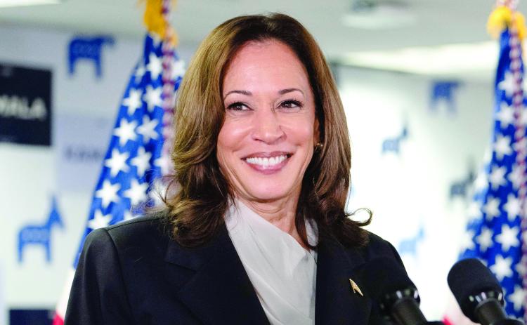 U.S. Vice President and Democratic presidential candidate Kamala Harris speaks at her campaign headquarters in Wilmington, Delaware, on Monday. Harris received an endorsement from President Joe Biden after he withdrew from the race Sunday. (ERIN SCHAFF/AFP/Getty Images/TNS)