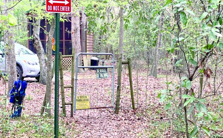 A gate into Rum Island Park from a neighboring property that stands in place of a county fence, which Columbia County officials say was cut to provide free access into the park. (FILE)