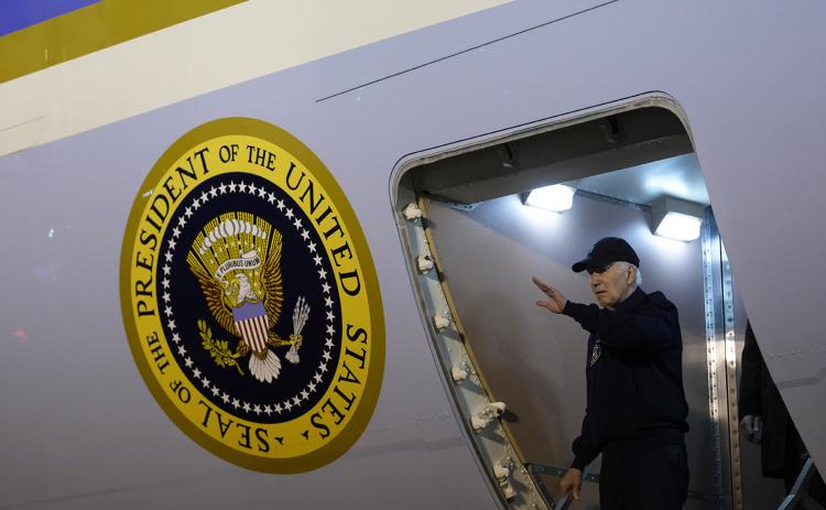 President Joe Biden steps off of Air Force One upon arrival at Dover Air Force Base in Dover, Delaware, on Wednesday. Biden tested positive for covid-19 with mild symptoms that day. (KENT NISHIMURA/AFP via Getty Images/TNS)