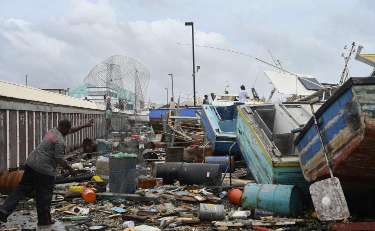 Damaged fishing boats pile up against each other after Hurricane Beryl at the Bridgetown Fish Market, Bridgetown, Barbados, on Monday. (Randy Brooks/AFP/Getty Images/TNS)