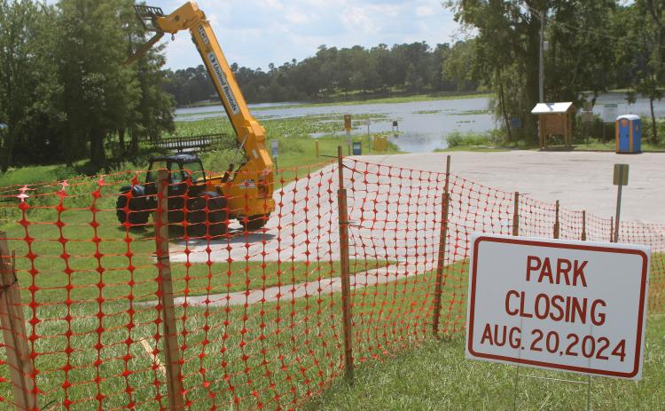 Campbell Park and access to Lake Montgomery were closed Tuesday as construction is set to begin on a new fishing pier on the lake near downtown Lake City. (TONY BRITT/Lake City Reporter)