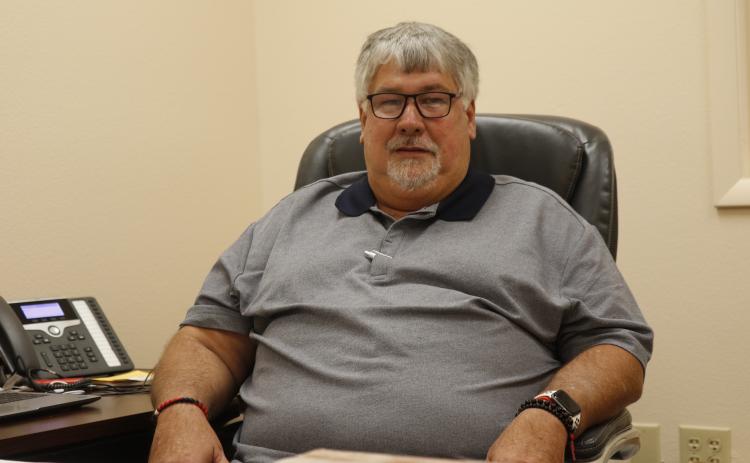 Keith Couey, pictured sitting in his office at the Columbia County School District administration building as he transitions into becoming the district’s superintendent in November, aims to remain visible at school sites. (JAMIE WACHTER/Lake City Reporter)