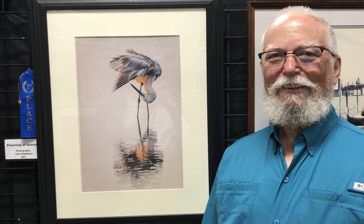John Middleton, of Mayo, won the Branford Camera Club’s photography contest with his entry ‘Preening at Sunrise.’ The contest entries are exhibited at the Gateway Art Gallery through August. (COURTESY)