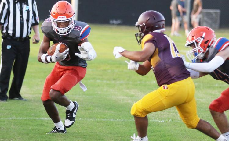 Branford receiver Maurice Vought runs up the field after a catch against Crescent City during their Preseason Jamboree on Aug. 16. (MORGAN MCMULLEN/Lake City Reporter)