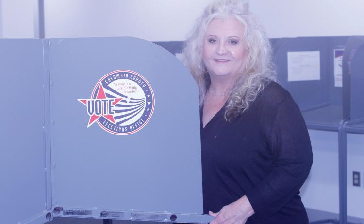 Columbia County Supervisor of Elections Tomi Brown, pictured in the voting room at the elections office, said her staff is ready for early voting, which runs through Aug. 17. (JAMIE WACHTER/Lake City Reporter)