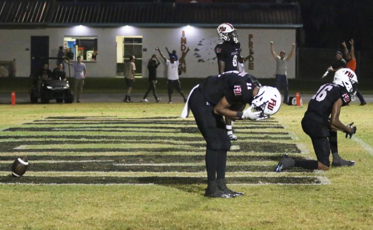 Fort White defensive back Gavin Peterson (11) reacts after Taylor County scored the game-winning touchdown in overtime on Friday. (MORGAN MCMULLEN/Lake City Reporter)