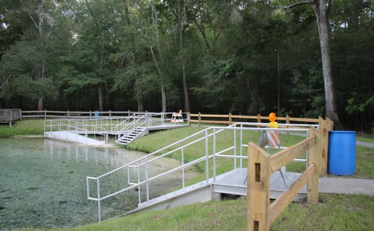 Rum Island Park, pictured as it was set to open in 2020 following bank restoration work, is in need of repairs for that work following vandalism and high water. The Suwannee River Water Management District approved funding for that project Tuesday. (FILE)