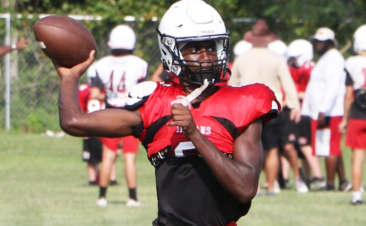 Fort White quarterback Jayden Jackson throws a pass during Thursday’s practice. (MORGAN MCMULLEN/Lake City Reporter)