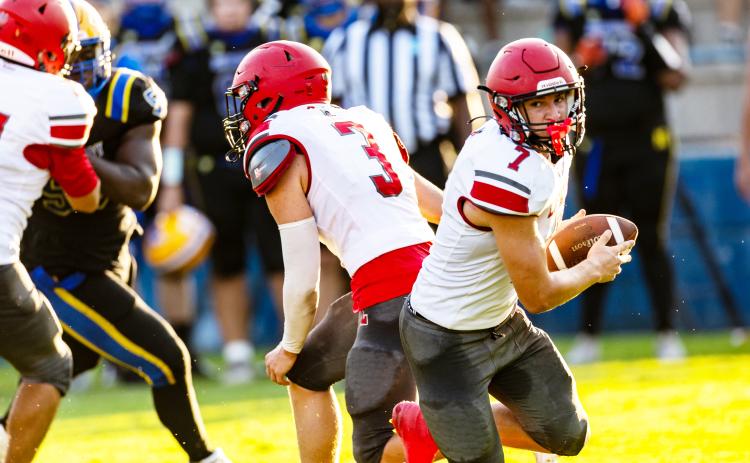 Lafayette receiver Parker Hill turns up field after taking a handoff during the Preseason Classic against Newberry on Aug. 15. (JACK HOWDESHELL/Lake City Reporter)