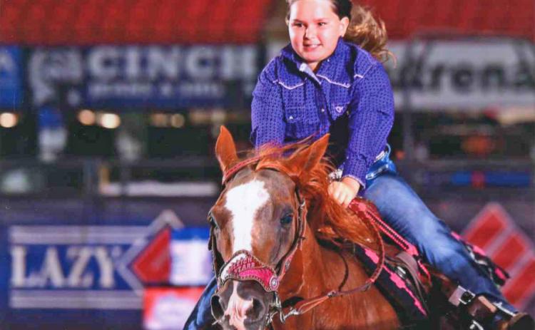 Raleigh Milligan qualified for the NLBRA finals in four events this summer, including barrels, pole pending, flag race and goat untying. (COURTESY)