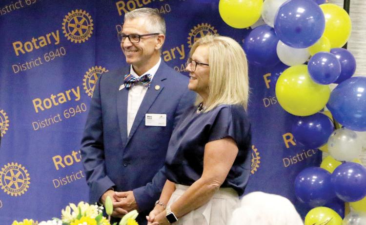 Mike Tatem is all smiles with his wife, Judy, when he was sworn in as the district governor for Rotary International District 6940 in June. Tatem hopes to help improve disaster response across the district during his term as governor. (MORGAN MCMULLEN/Lake City Reporter)