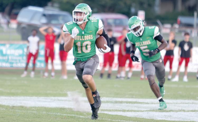 Suwannee defensive back Koy Frier races downfield after intercepting a pass against Bishop Kenny in the Preseason Classic on Aug. 16. (PAUL BUCHANAN/Lake City Reporter)