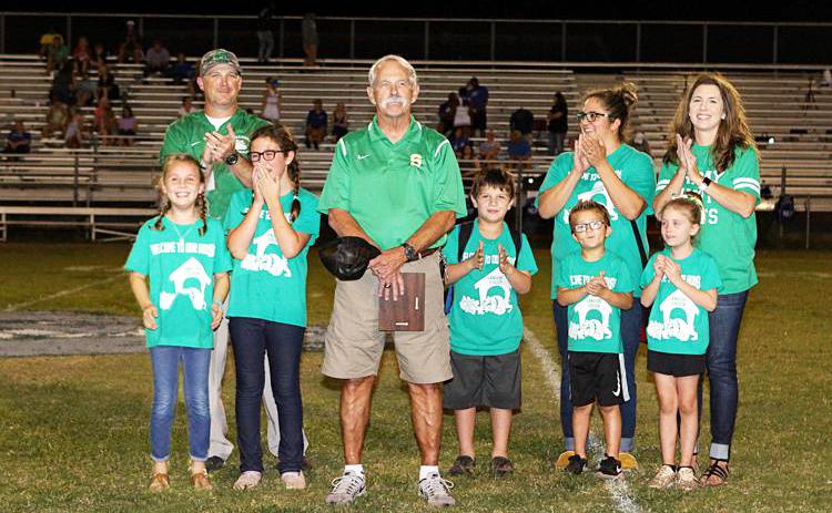 Ron Hall, fourth from left and pictured with his family, was inducted into the Suwannee Hall of Fame in 2018. (PAUL BUCHANAN/Lake City Reporter))