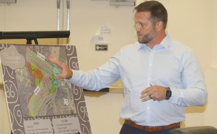 Lance Jones with Jones Engineering goes over the plan for Penelope Place, a mixed-use development that would include single-family houses, apartments and a commercial element, during Tuesday’s planning and zoning board meeting about the proposal. (TONY BRITT/Lake City Reporter)