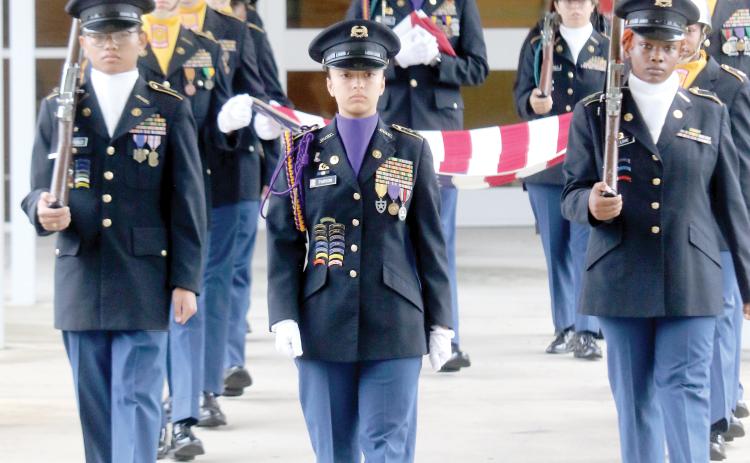 Kiersten Parson, Columbia High JROTC Battalion Commander, leads the cadets on the annual 9/11 Memorial March at the school Wednesday morning. (TONY BRITT/Lake City Reporter)