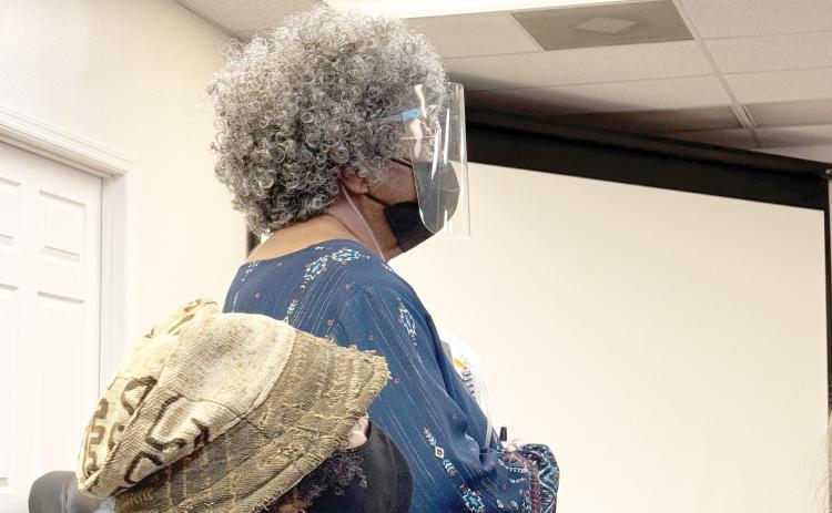 Bernice Presley stands up during the Lake City Council’s discussion about rescinding the name of a portion of NE Railroad Street to NE Presley Lane to honor her family’s positive impact on the community. (JAMIE WACHTER/Lake City Reporter)