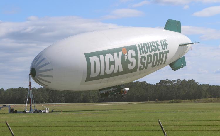 A Dick’s Sporting Goods blimp was docked at the Florida Gateway Airport Tuesday after it evacuated from the path of Hurricane Milton. (TONY BRITT/Lake City Reporter)