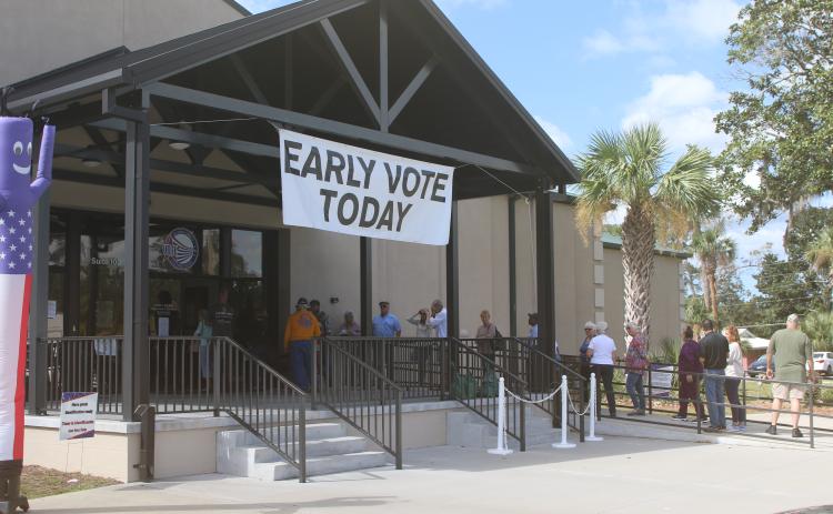 Columbia County voters wait in line last week at the Supervisor of Elections office to cast their ballots during early voting for the general election. (TONY BRITT/Lake City Reporter)