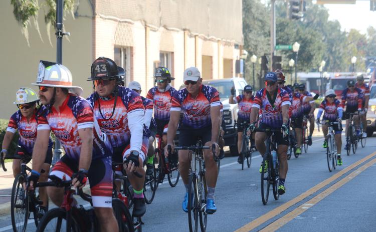 First Responders participating in the 2024 Brotherhood Ride, travel down Marion Avenue on their way to Lake City Elks Lodge #893 on Monday. (TONY BRITT/Lake City Reporter)