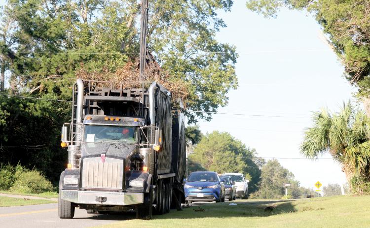 Columbia County crews and contractors are continuing to pick up debris from Hurricane Helene, already gathering as much as from Idalia a year ago. (JAMIE WACHTER/Lake City Reporter)