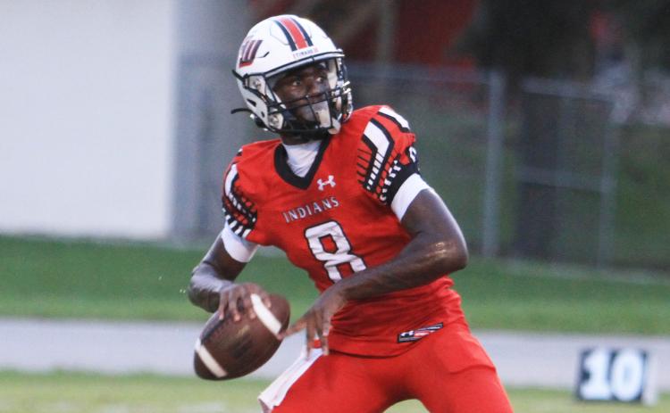 Fort White quarterback Jayden Jackson winds up to pass against Fernandina Beach on Sept. 13. (PAUL BUCHANAN/Lake City Reporter)
