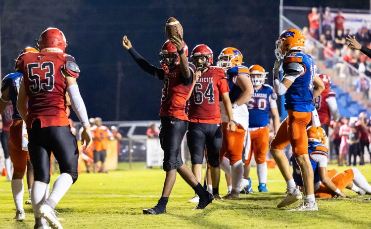 Lafayette quarterback Tywan Williamson (9) celebrates after scoring a touchdown against Branford on Monday. (JACK HOWDESHELL/Lake City Reporter)