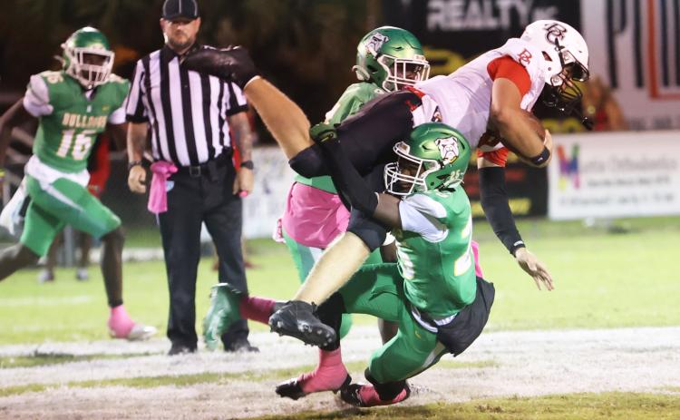 Suwannee defensive back Jeremy Webb makes a tackle against Baker County on Friday. (PAUL BUCHANAN/Lake City Reporter)