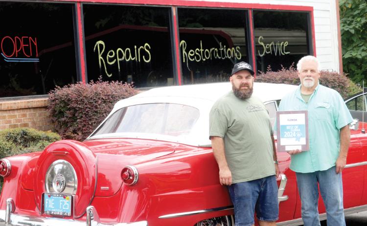 Sherm’s Auto Repair and Restoration was nominated previously for the Guide to Florida Best of Florida award for best auto repair center, but this year’s award was the first time it has captured the honor. Sherman Stanley, the repair shop owner, pictured with his son, Tre’s Stanley, said it is big recognition. (TONY BRITT/Lake City Reporter)