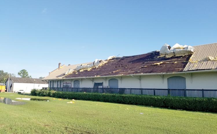 The roof on the 1903 Atlantic Coast Line Freight Station, which houses the Suwannee County Historical Museum, was peeled off during Hurricane Helene. Crews have already done a temporary fix on the roof to protect the artifacts and displays inside the museum. (COURTESY ERIC MUSGROVE)