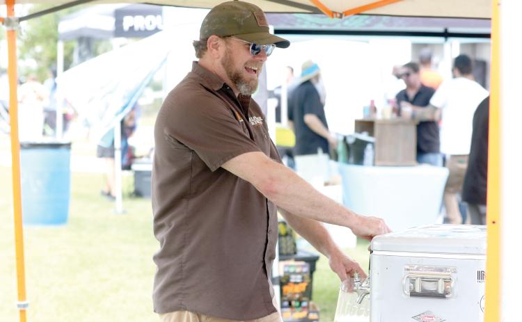 Halpatter Brewing Company’s Chris Candler said the Gateway City Craft Beer and Wine Festival was a great event, which also draws visitors to the brewery itself. (MORGAN MCMULLEN/Lake City Reporter)