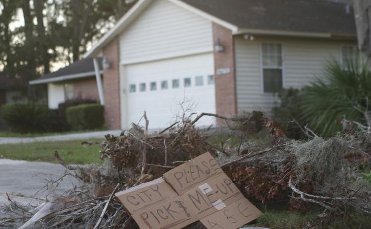 A pile of debris left over from Hurricane Helene awaits pickup. (TONY BRITT/Lake City Reporter)