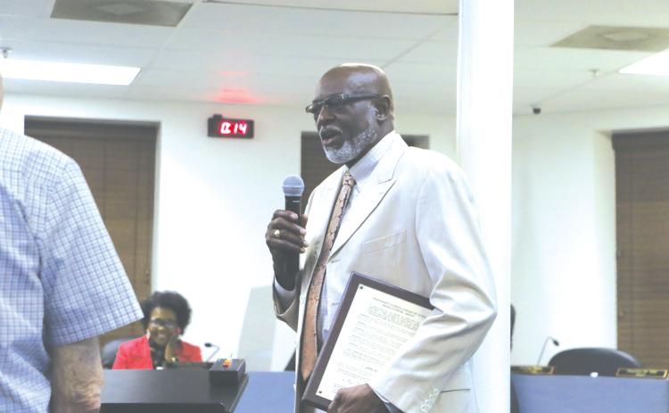 Lake City Councilman Jake Hill Jr. addresses the council after receiving a plaque for his years of service as a member of the Northeast Florida League of Cities board. (MORGAN MCMULLEN/Lake City Reporter)