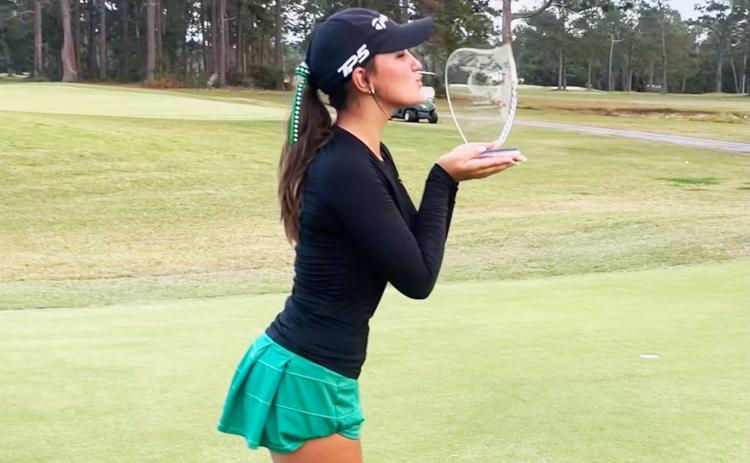 Suwannee golfer Ryan Donaldson celebrates with the Region 1-2A trophy after winning the tournament with a 2-under-69 on Tuesday. (COURTESY)