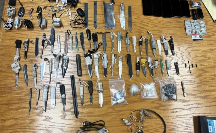The contraband collected during an unannounced sweep at Suwannee Correctional Institution included 50 weapons as well as drugs, alcohol and phones. (COURTESY FLORIDA DEPARTMENT OF CORRECTIONS)