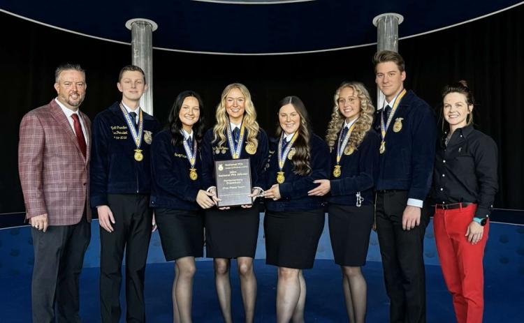 The Lafayette FFA parliamentary procedure team, which included Trey Galbraith, Wyatt Chandler, Alyssa Jones, Sidney Wimberley, Delaney Deadwyler and Emily Reese Thomas won the national title at the FFA Convention in Indianapolis. (COURTESY)