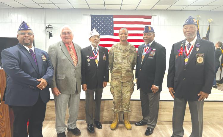 Command Officer Walker, Mayor Witt, Commanding Sergeant Major Smith, Minuteman Scholarship and Army Reserve Cadet Victoria Coker, Command Sergeant Major Walden, and Sgt. Bolden participated in an Our Community Cares Coalition event designating several local cities, towns and counties as Purple Heart Communities. (COURTESY)