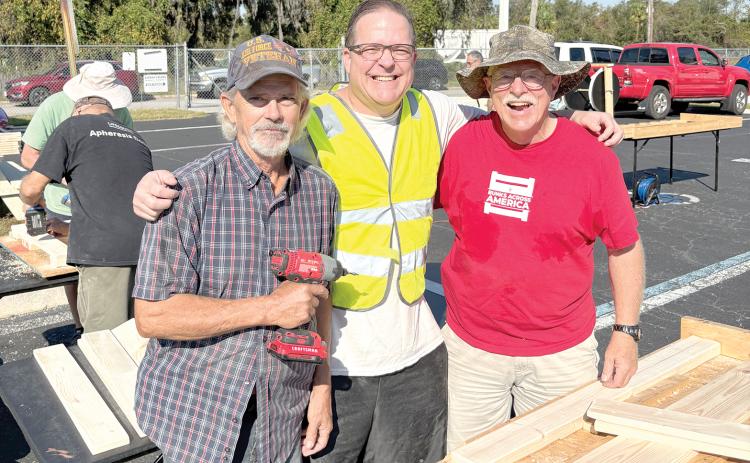 Robert Stuart (from left), Christopher Costello and Rick Fortney helped build 22 new beds for Columbia County children who don’t have one. (COURTESY)