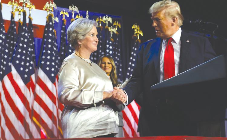 Donald Trump praises his campaign senior adviser Susie Wiles during election night. (CHIP SOMODEVILLA/Getty Images/TNS)