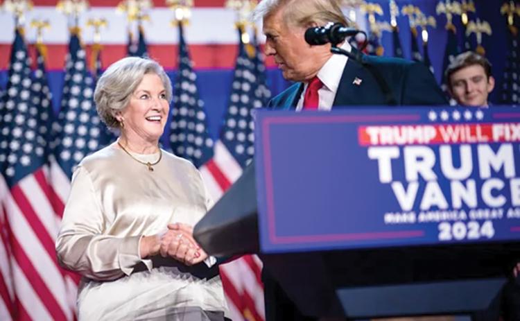 Susie Wiles speaks with Donald Trump after he was declared the winner during an election night watch party last week at the Palm Beach County Convention Center in West Palm Beach. (JABIN BOTSFORD/The Washington Post/Getty Images/MCT)
