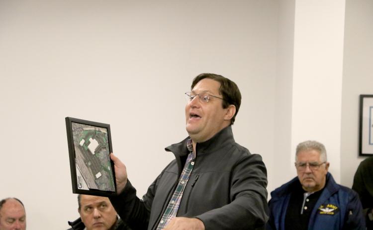 Christopher Gmuer of Gmuer Engineering answers questions about the proposed I-75 Toyota of Lake City dealership north of HCA Lake City Hospital. (MORGAN MCMULLEN/Lake City Reporter)