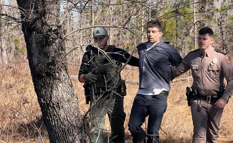 Toby White, wanted for murder in Santa Rosa County, was apprehended Saturday in southeastern Suwannee County following a two-day search in both Columbia and Suwannee counties. White fled from a traffic stop Friday near Fort White in a stolen truck. (COURTESY SUWANNEE COUNTY SHERIFF'S OFFICE)