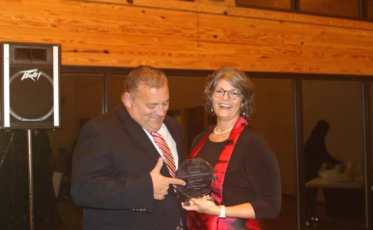 Branford High history teacher Karen Braun celebrates with her husband, Mike, after being named Suwannee County’s Teacher of the Year on Tuesday. (TONY BRITT/Lake City Reporter)