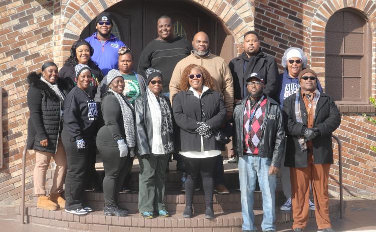 A group of local residents, pictured, braved freezing temperatures on Monday morning and held their own 1.5 mile from the Richardson Community Center to Annie Mattox Park after organizers canceled the MLK Day Parade. Many of the walkers said they felt the parade and King’s legacy was too important to forgo the event due to weather conditions. (TONY BRITT/Lake City Reporter)