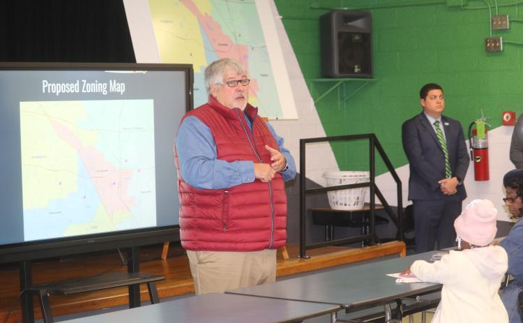 Superintendent Keith Couey discusses the new zoning proposal at a town hall meeting Tuesday at Five Points Elementary. (TONY BRITT/Lake City Reporter)