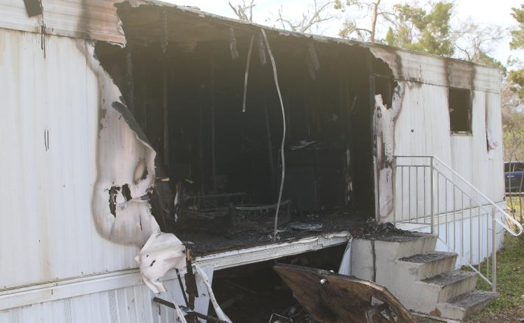 A person was killed Monday morning when a single-wide mobile home caught fire north of Lake City. The cause of the fire is still being investigated. (TONY BRITT/Lake City Reporter)