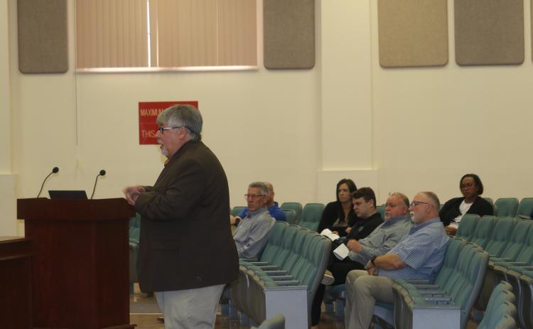 Columbia County Schools Superintendent Keith Couey talks to the School Board about new zoning maps Tuesday. (TONY BRITT/Lake City Reporter)