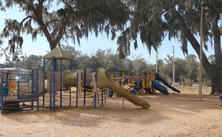 The playground at Youngs Park could use handicap accessible equipment and sidewalk, according to the master plan performed by Tocoi Engineering for the City of Lake City. (JAMIE WACHTER/Lake City Reporter)